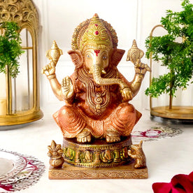  Enhance your home with the vibrant charm of this Colored Brass Ganesh Statue, a perfect fusion of tradition and artistry. Crafted from high-quality brass and adorned with vivid hand-painted colors, this exquisite idol beautifully represents Lord Ganesha, the remover of obstacles and symbol of prosperity. 
