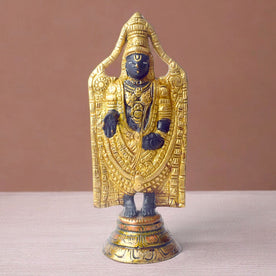  This 8-inch Tirupati Balaji sculpture beautifully captures the divine form of Lord Venkateshwara, radiating blessings of peace, prosperity, and devotion. Handcrafted with intricate details, this idol represents the sacred energy and compassion of the Lord, bringing a sense of tranquility to your space. 