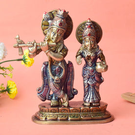 The 6.7 Inch Sacred Radha Krishna Idol – Embrace of Love and Devotion beautifully captures the divine bond between Radha and Krishna, symbolizing pure love and unwavering devotion. This intricately designed idol portrays the eternal couple in a graceful embrace, with Krishna holding his flute and Radha by his side, radiating serenity and spiritual harmony.