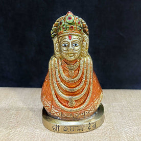 This Khatu Shyam idol is a symbol of divine grace, devotion, and spiritual protection. Crafted with exquisite detail, it beautifully captures the serene expression of Lord Khatu Shyam, a revered deity known for bestowing blessings of prosperity, health, and happiness upon his devotees.