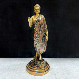  This 10-inch Buddha statue in a standing pose radiates grace and spiritual power. Carefully crafted with fine details, it embodies strength, peace, and enlightenment. The standing pose represents the Buddha’s readiness to guide those on their spiritual journey. 