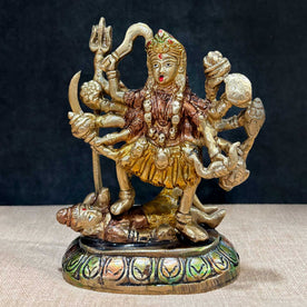 Embrace the divine power and energy of Kali Mata with this intricately handcrafted 6-inch Brass Kali Mata Idol. Known as the goddess of destruction, transformation, and liberation, Kali Mata represents the removal of negativity and the triumph of good over evil.