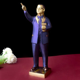  Dr. Bheem Rao Ambedkar with this 11.8-inch majestic idol, expertly crafted to honor his dedication to equality and social justice. Standing tall with pride, this idol captures Dr. Ambedkar’s unwavering commitment to uplifting the marginalized and promoting a just society. 