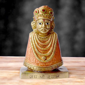  This 6.3-inch Khatu Shyam idol is a symbol of divine grace, devotion, and spiritual protection. Crafted with exquisite detail, it beautifully captures the serene expression of Lord Khatu Shyam, a revered deity known for bestowing blessings of prosperity, health, and happiness upon his devotees. 